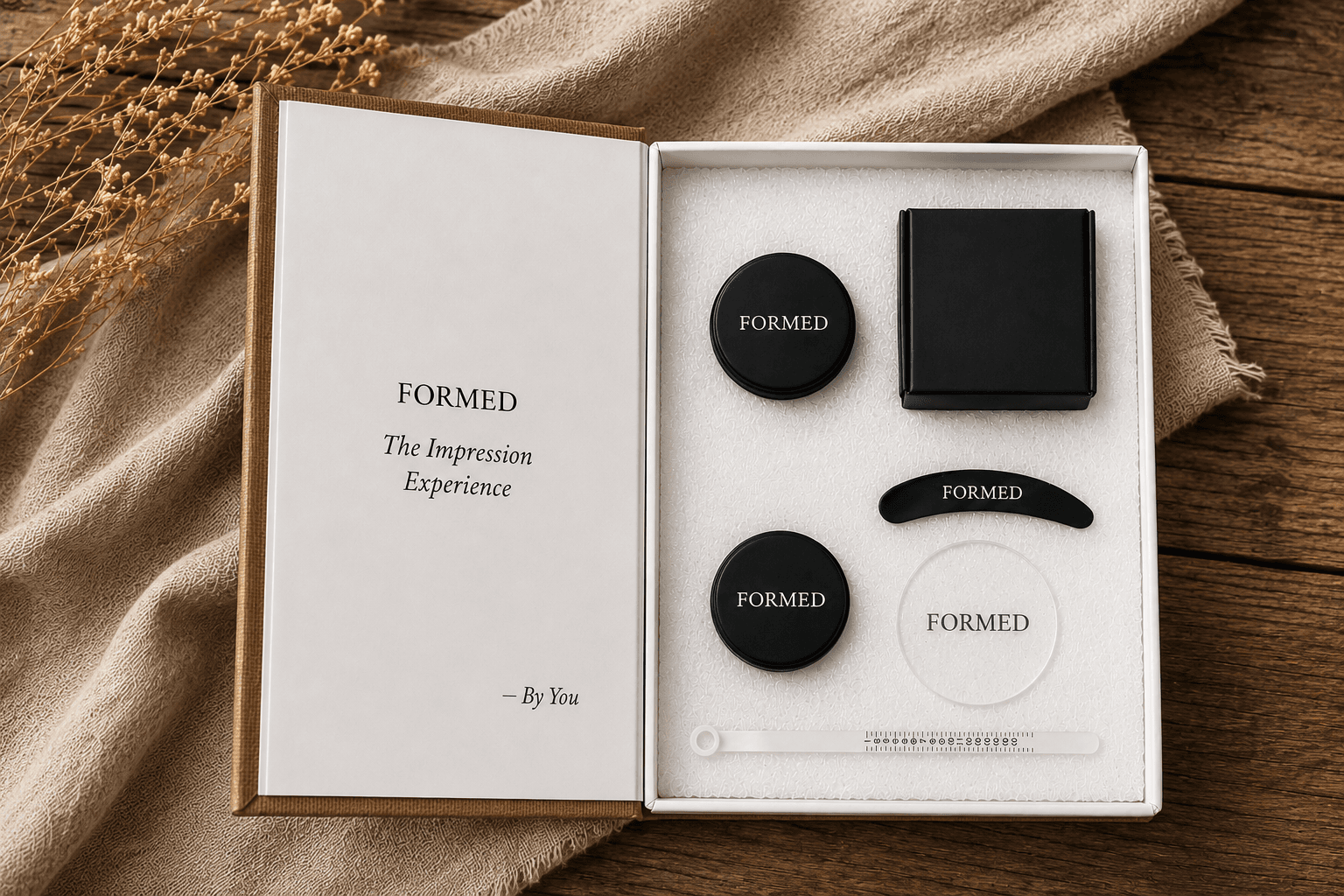 Impression Experience box opened, showing moulding compound and tools
