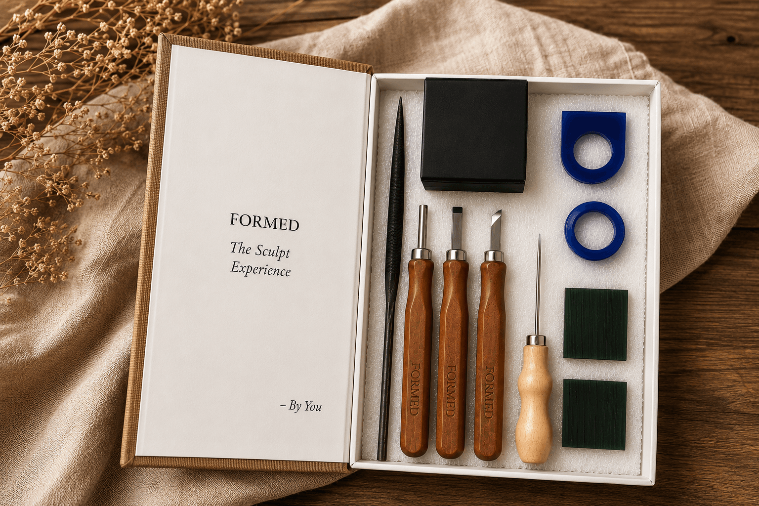 Sculpting Experience box opened, showing wax and carving tools